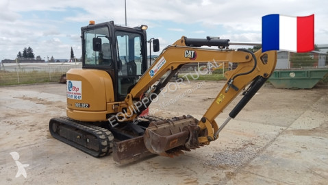 Mini-escavadora Caterpillar