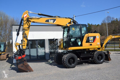 Escavatore gommato Caterpillar