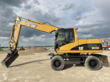 Excavadora de ruedas Caterpillar