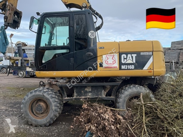 Pelle sur pneus Caterpillar