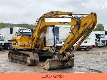 Caterpillar M318 318B Mit Zwei Löffeln