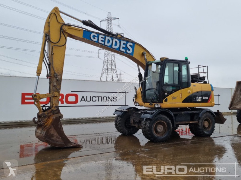 Lopatový nakládač Caterpillar D