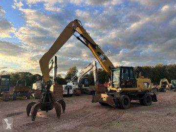 Pelle sur pneus Caterpillar