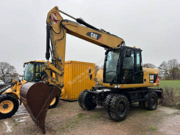 Pelle sur pneus Caterpillar