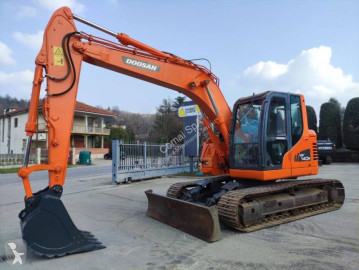 Abbiamo provato l'escavatore cingolato Doosan DX380 LC-5
