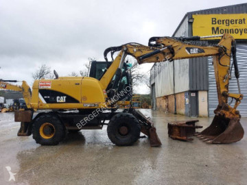 Pelle sur pneus Caterpillar