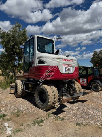 Graafmachine op banden Takeuchi