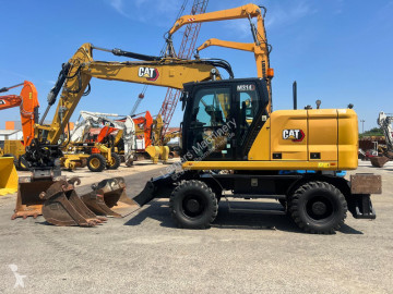 Pelle sur pneus Caterpillar