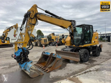 Pelle sur pneus Caterpillar