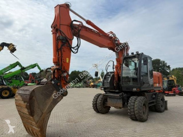 Graafmachine op banden Hitachi