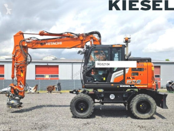 Graafmachine op banden Hitachi