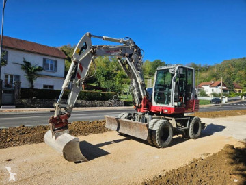 Колісний екскаватор Takeuchi