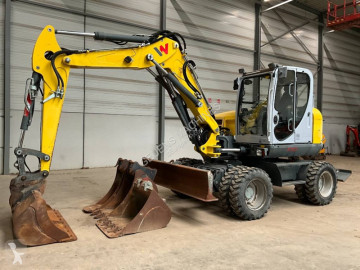 Graafmachine op banden Neuson