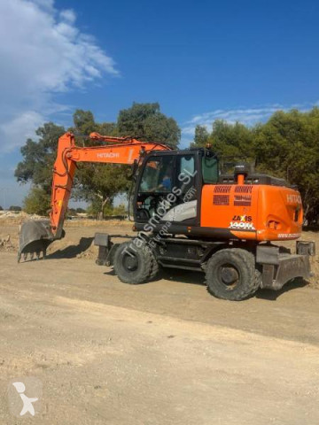 Hitachi gumiabroncsos kotrógép
