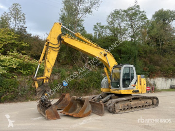 New Holland lánctalpas kotrógép
