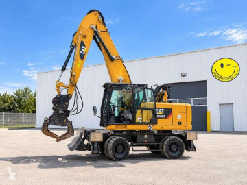Pelle de manutention Caterpillar