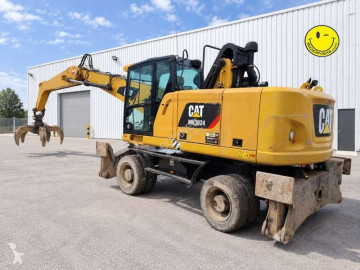 Pelle de manutention Caterpillar