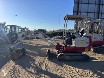 Mini-escavadora Takeuchi