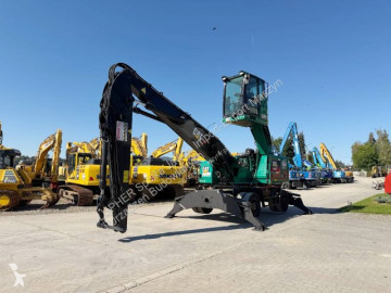 Pelle de manutention Caterpillar