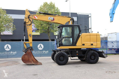 Pelle sur pneus Caterpillar