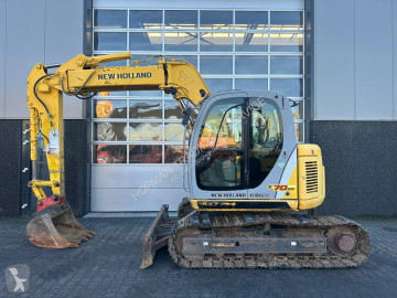 Mini-lopata New Holland