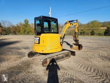 Минибагер Caterpillar