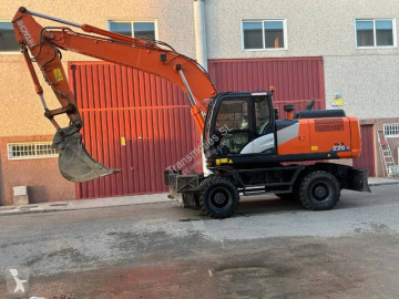 Graafmachine op banden Hitachi
