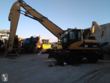 Caterpillar M 318 C MH pelle de manutention occasion