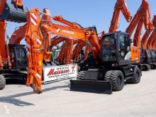 Hitachi zx140wt-6 használt gumiabroncsos kotrógép