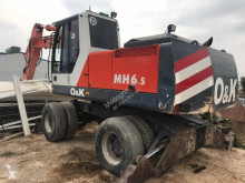 O&K MH 6.5 pelle sur pneus occasion