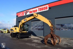 Pelle sur pneus Caterpillar M318D