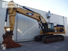 Caterpillar 374DL pásová lopata použitý