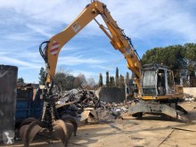 Excavadora excavadora de ruedas Liebherr Caricatore Liebher A 904 - Ragno 6 Polipo girevole