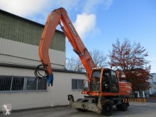 Pelle de manutention Doosan DX210 W DX210WMH