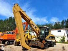 Caterpillar M322C HCR escavadora de rodas usada
