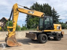 Excavadora excavadora de ruedas Caterpillar M316D ATTACHGE RAPIDE LAME STABILISATEURS