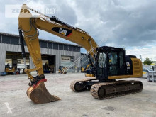 Caterpillar 320EL pásová lopata použitý