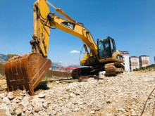 Caterpillar 324DL pásová lopata použitý