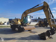 Caterpillar M313D gravemaskine på hjul brugt