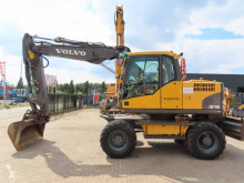 Volvo EW 140 C excavator pe roti second-hand