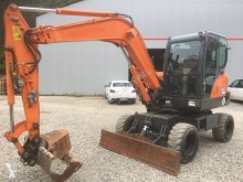 Pelle sur pneus Doosan DX55 W
