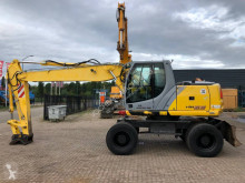 New Holland MH 5.6 колесен багер втора употреба