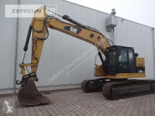 Pásová lopata Caterpillar 328DLCR