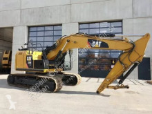 Caterpillar pásová lopata použitý