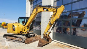 Минибагер Caterpillar
