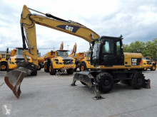 Caterpillar M315 pelle sur pneus occasion