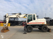 Caterpillar M313D VAH tweedehands graafmachine op banden