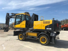 Excavadora Volvo EW 230 C excavadora de ruedas usada
