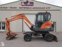 Excavadora Doosan DX55 W excavadora de ruedas usada