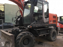 Hitachi ZX140W-3 excavator pe roti second-hand